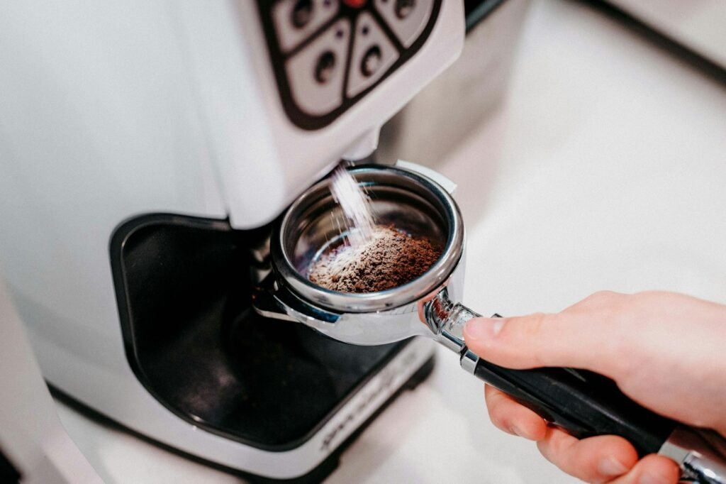 Coffee grinding directly into an espresso portafilter